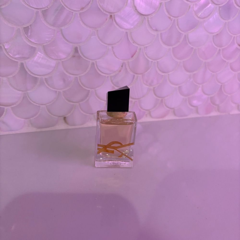 Yves Saint Laurent Perfume with Black and Gold Accents